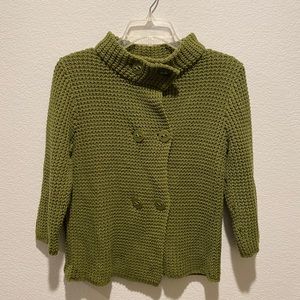 green sweater with buttons